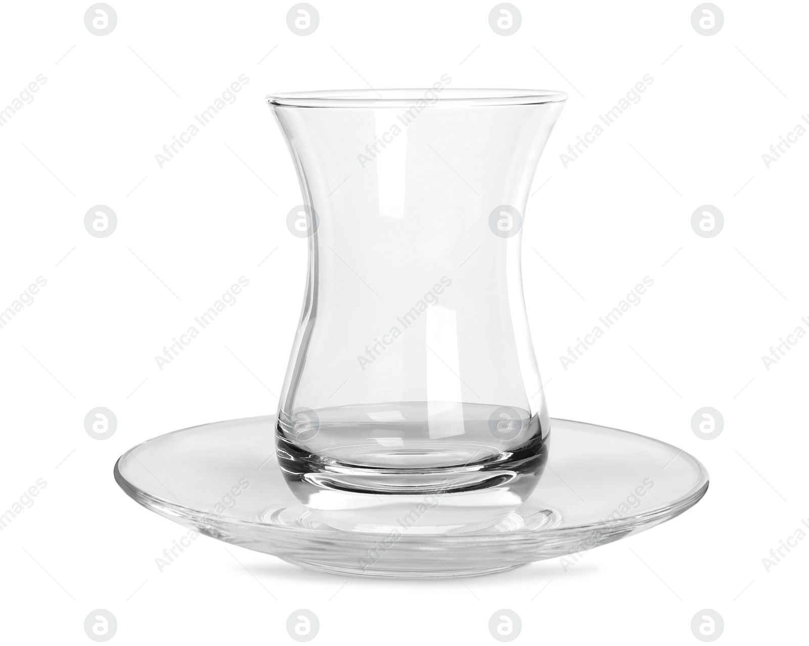 Photo of Empty glass for traditional Turkish tea and saucer isolated on white