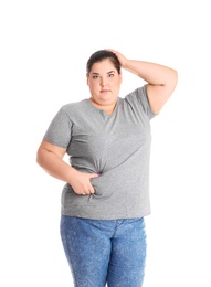 Overweight woman touching belly fat before weight loss on white background