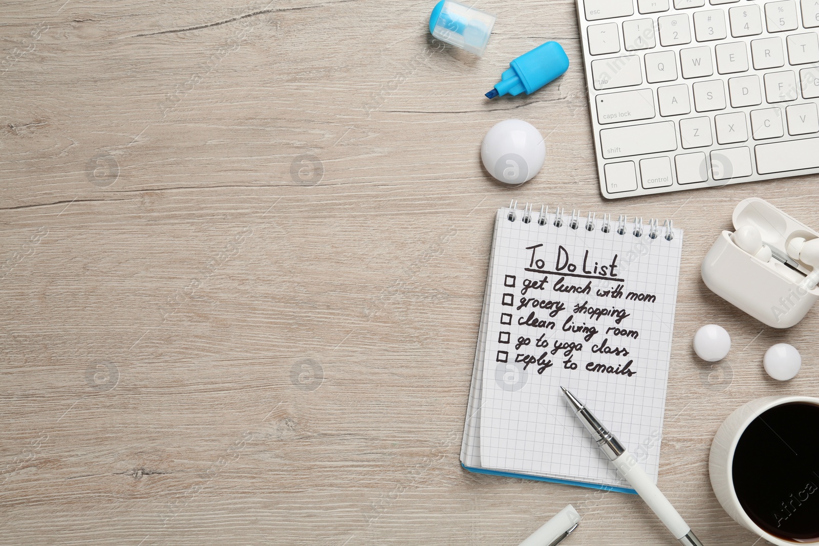 Photo of Flat lay composition with to do list on wooden table, space for text