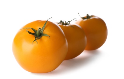 Photo of Delicious ripe yellow tomatoes isolated on white