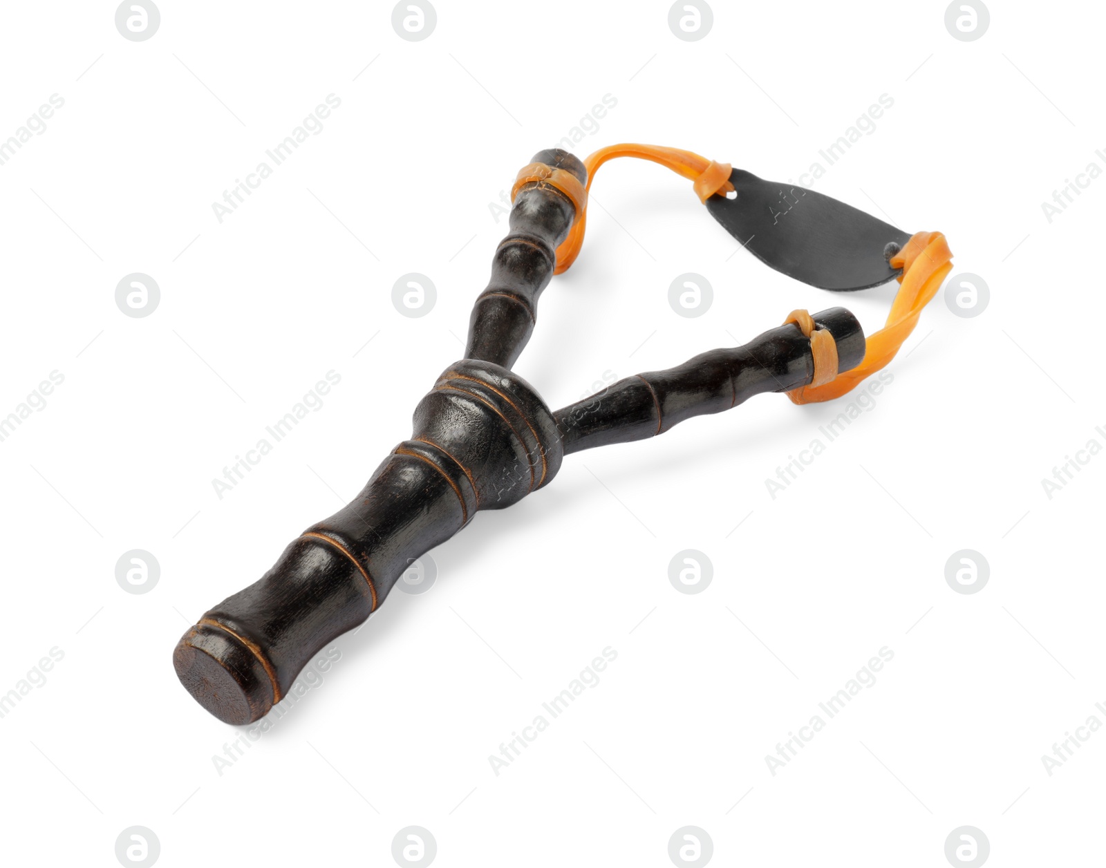 Photo of Black wooden slingshot with leather pouch on white background