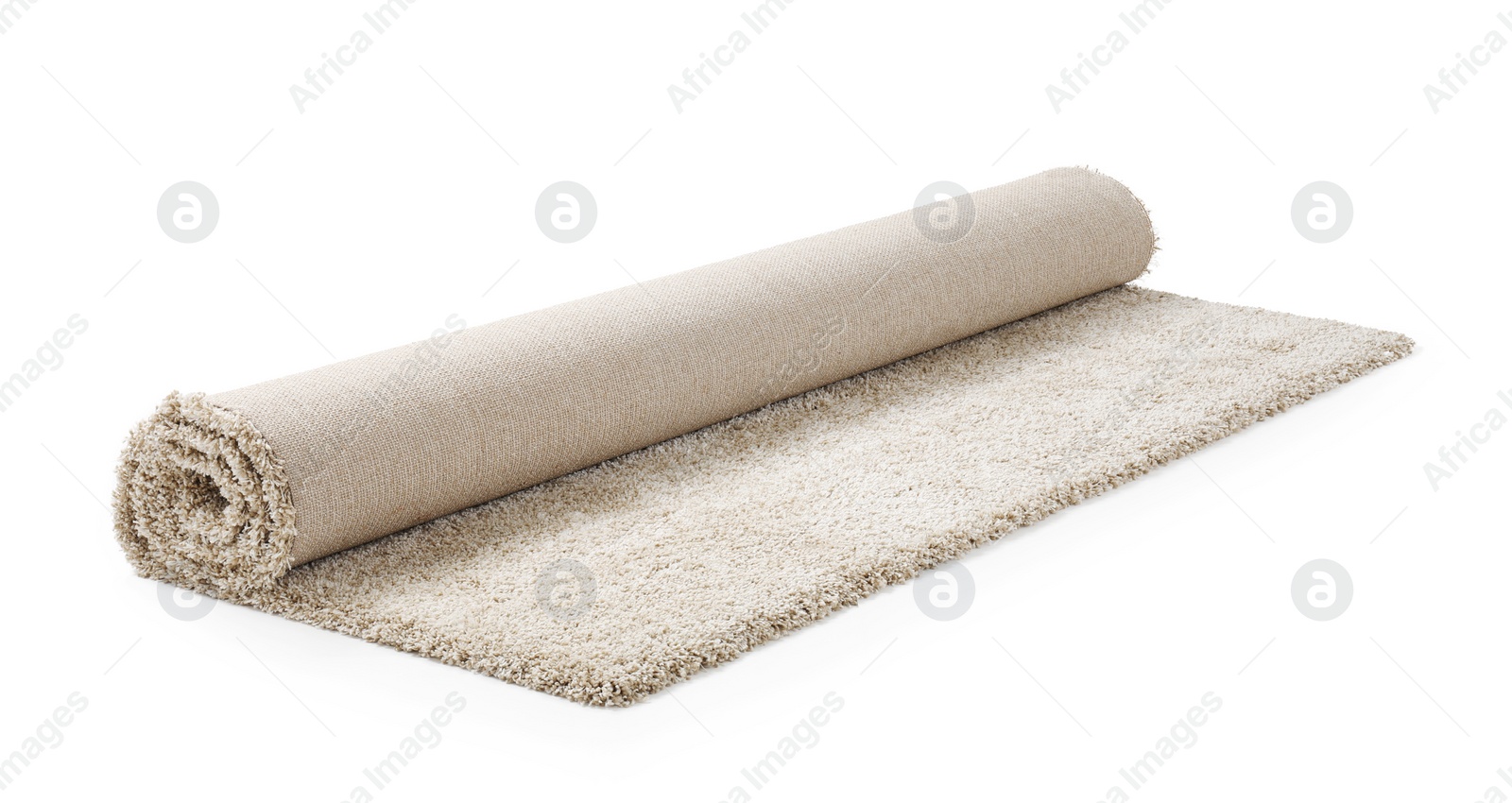 Photo of Rolled fuzzy carpet on white background. Interior element