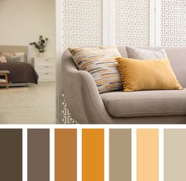 Image of Comfortable sofa with different cushions in living room. Interior design inspired by colors of the year 2021