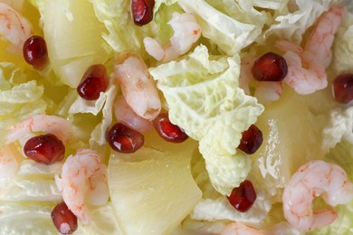 Photo of Delicious salad with Chinese cabbage, shrimps and pineapple as background, closeup