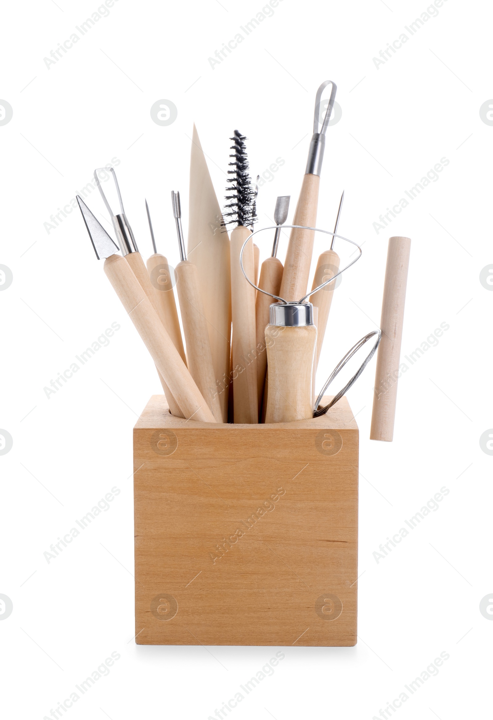 Photo of Set of different clay crafting tools in holder isolated on white