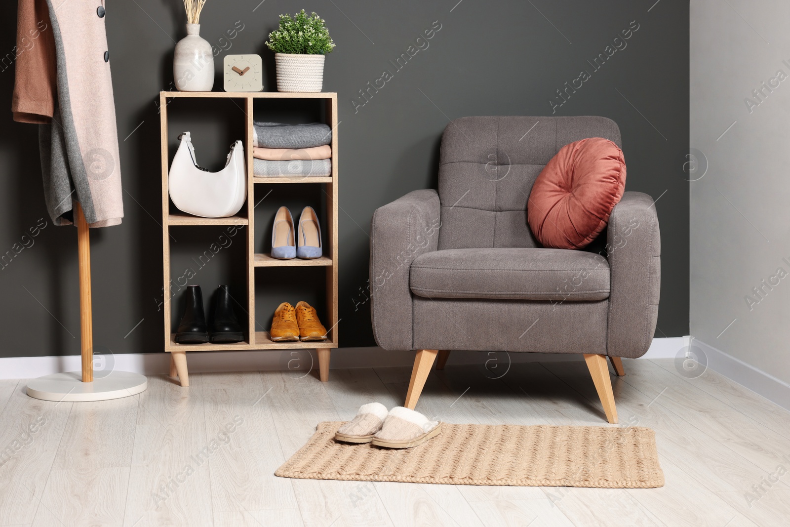 Photo of Modern hallway interior with stylish furniture and decorative elements