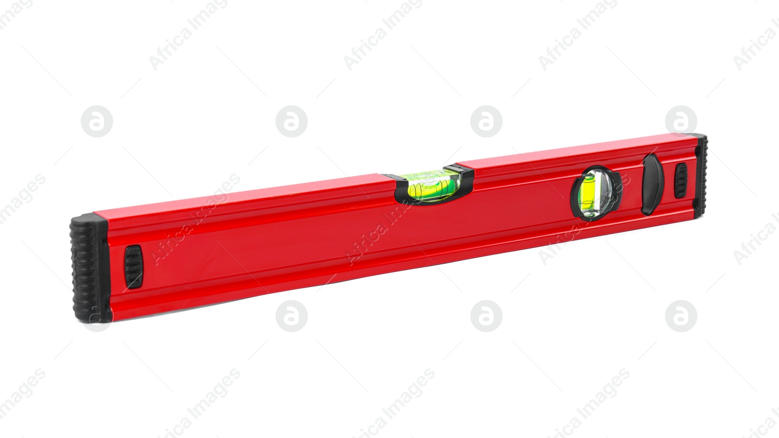 Photo of Red building level isolated on white. Construction tool