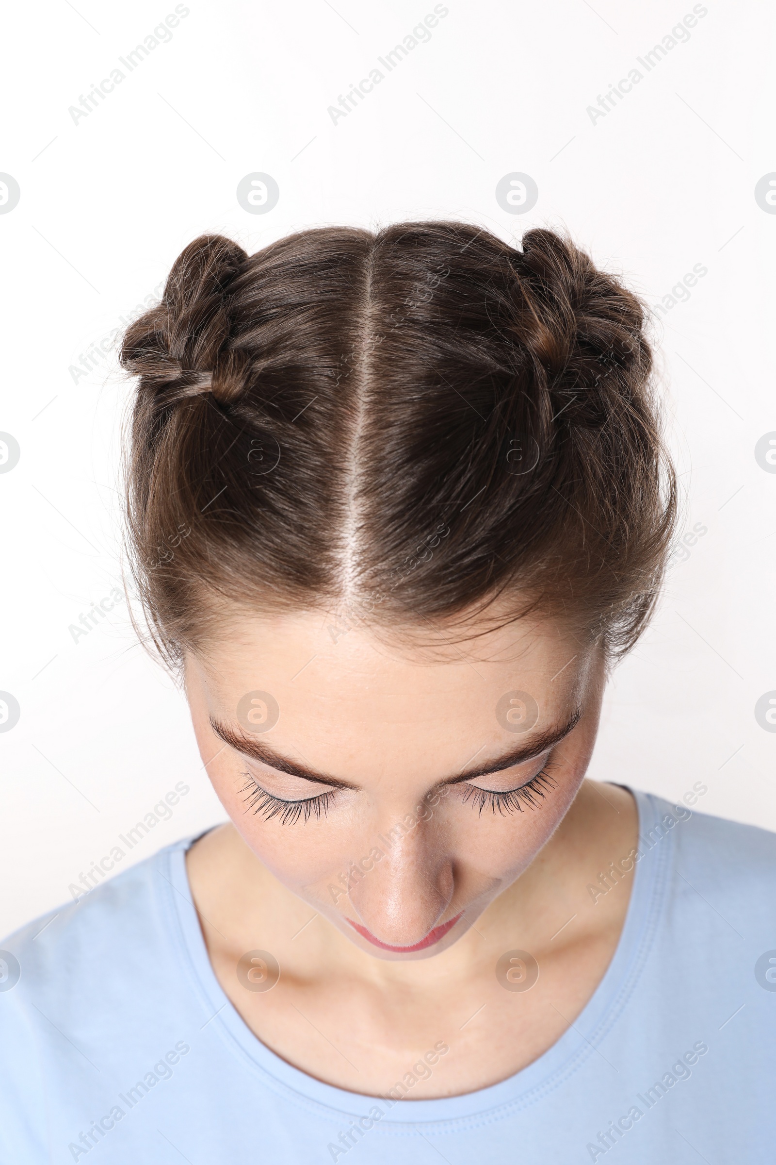 Photo of Woman with braided hair on white background