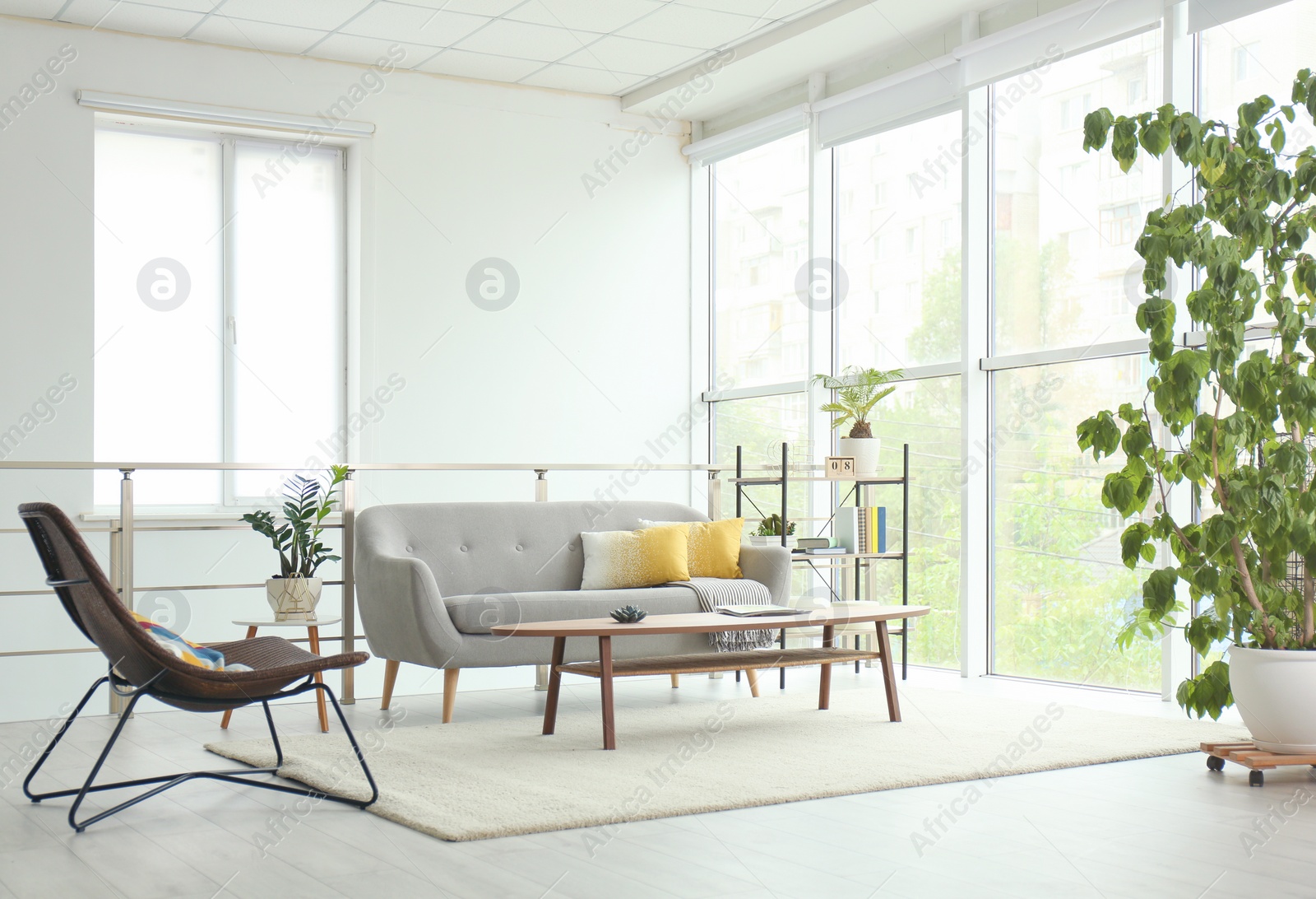 Photo of Elegant living room interior with comfortable sofa and coffee table