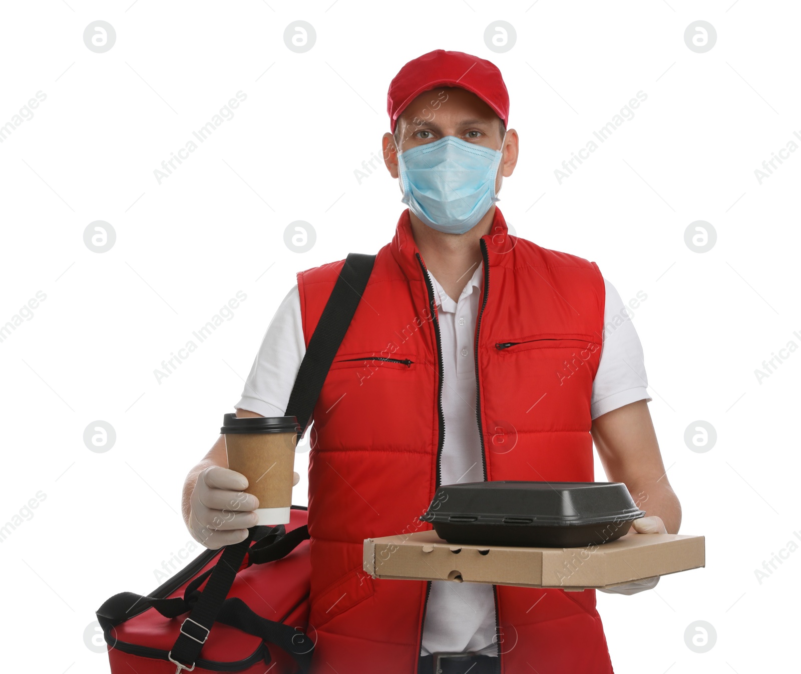 Photo of Courier in protective gloves and mask holding order on white background. Food delivery service during coronavirus quarantine