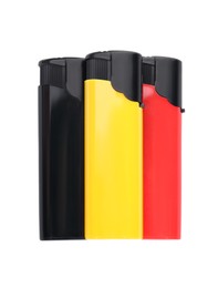 Stylish small pocket lighters on white background, top view