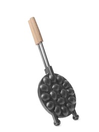 Walnut cookie mold with wooden handle isolated on white