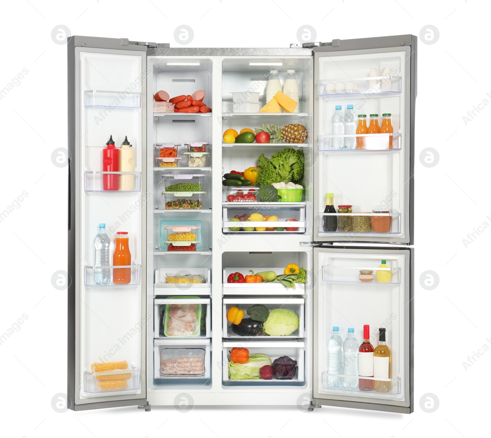 Photo of Open refrigerator full of products isolated on white