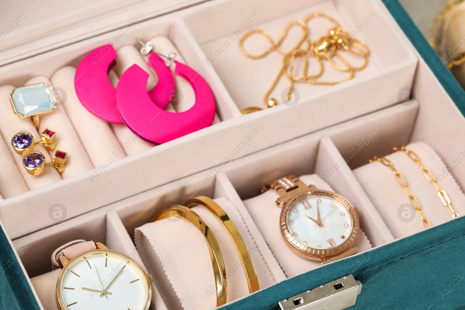 Photo of Jewelry box with many different accessories, closeup