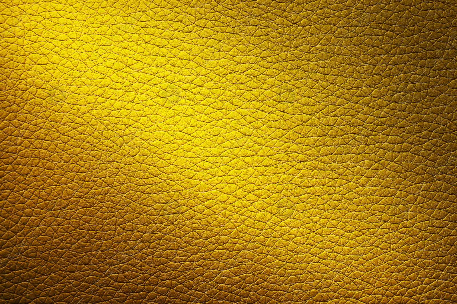 Image of Golden textured surface as background, closeup view