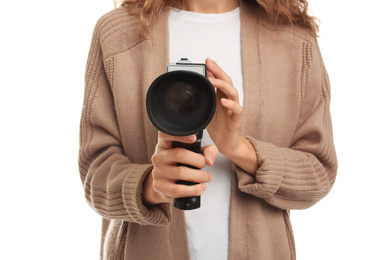 Woman with vintage video camera on white background, closeup