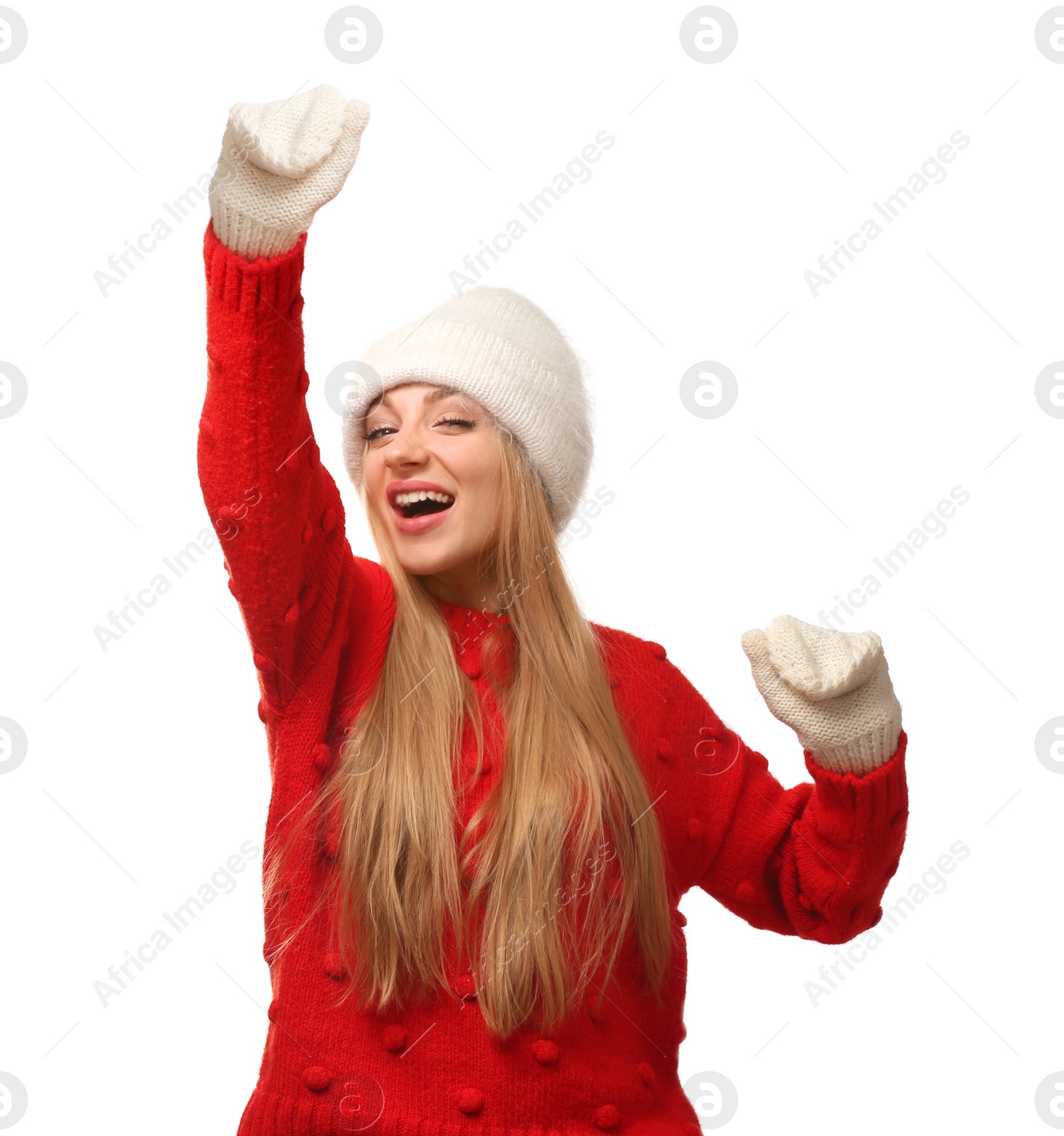 Photo of Portrait of emotional young woman in stylish clothes on white background. Winter atmosphere