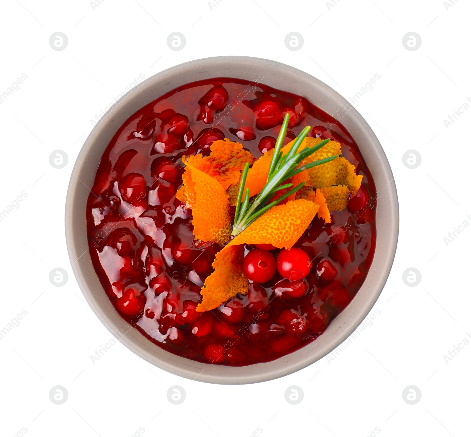 Photo of Fresh cranberry sauce, rosemary and orange peel in bowl isolated on white, top view