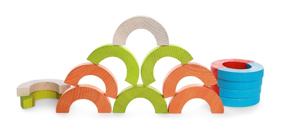 Colorful wooden pieces of play set isolated on white. Educational toy for motor skills development