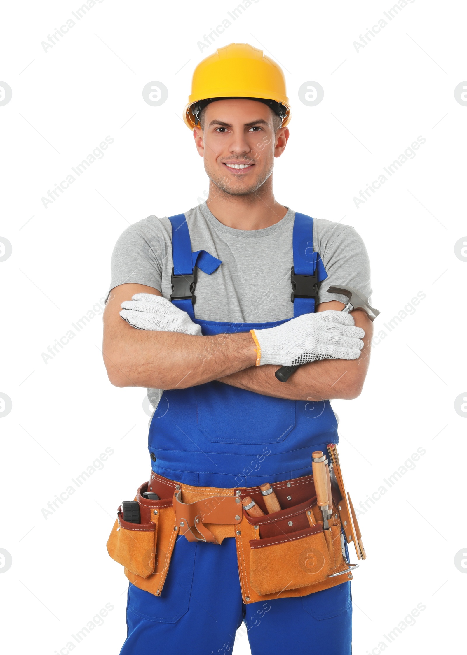 Photo of Handsome carpenter with hammer isolated on white