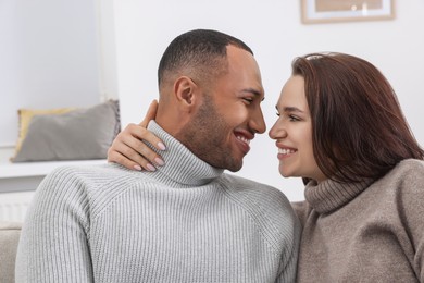 Photo of Dating agency. Happy couple enjoying time together at home