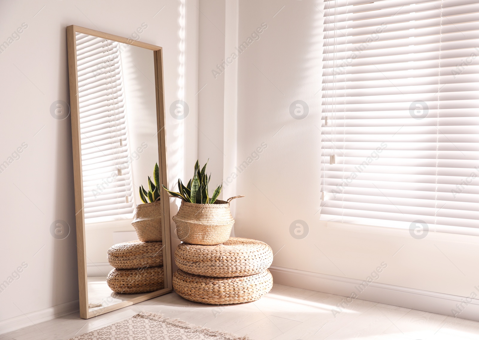 Photo of Large stylish mirror in room, space for text. Element of interior design