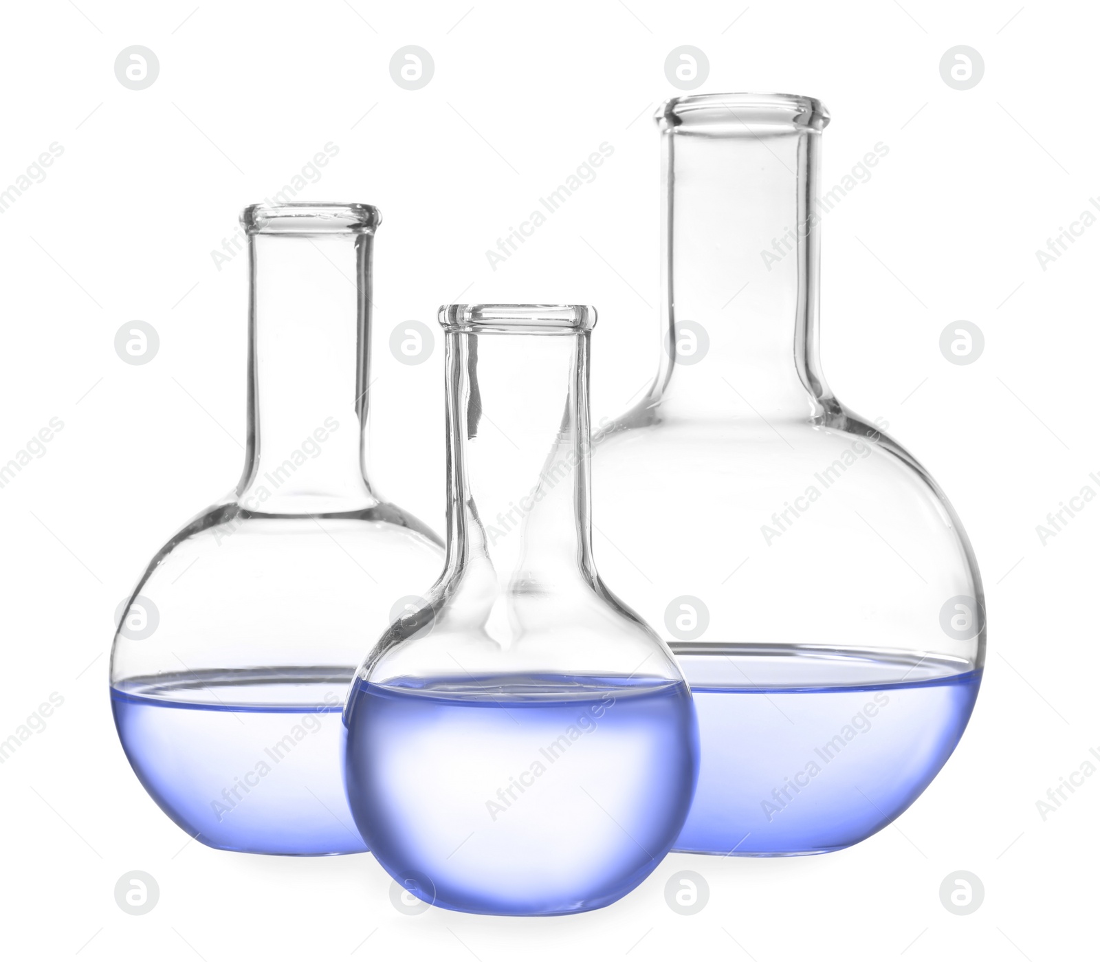 Image of Boiling flasks with blue liquid isolated on white. Laboratory glassware