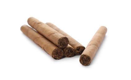 Photo of Cigars wrapped in tobacco leaves on white background