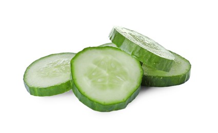 Photo of Slices of fresh ripe cucumber isolated on white