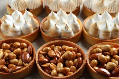 Photo of Many different tartlets on table, closeup. Tasty dessert