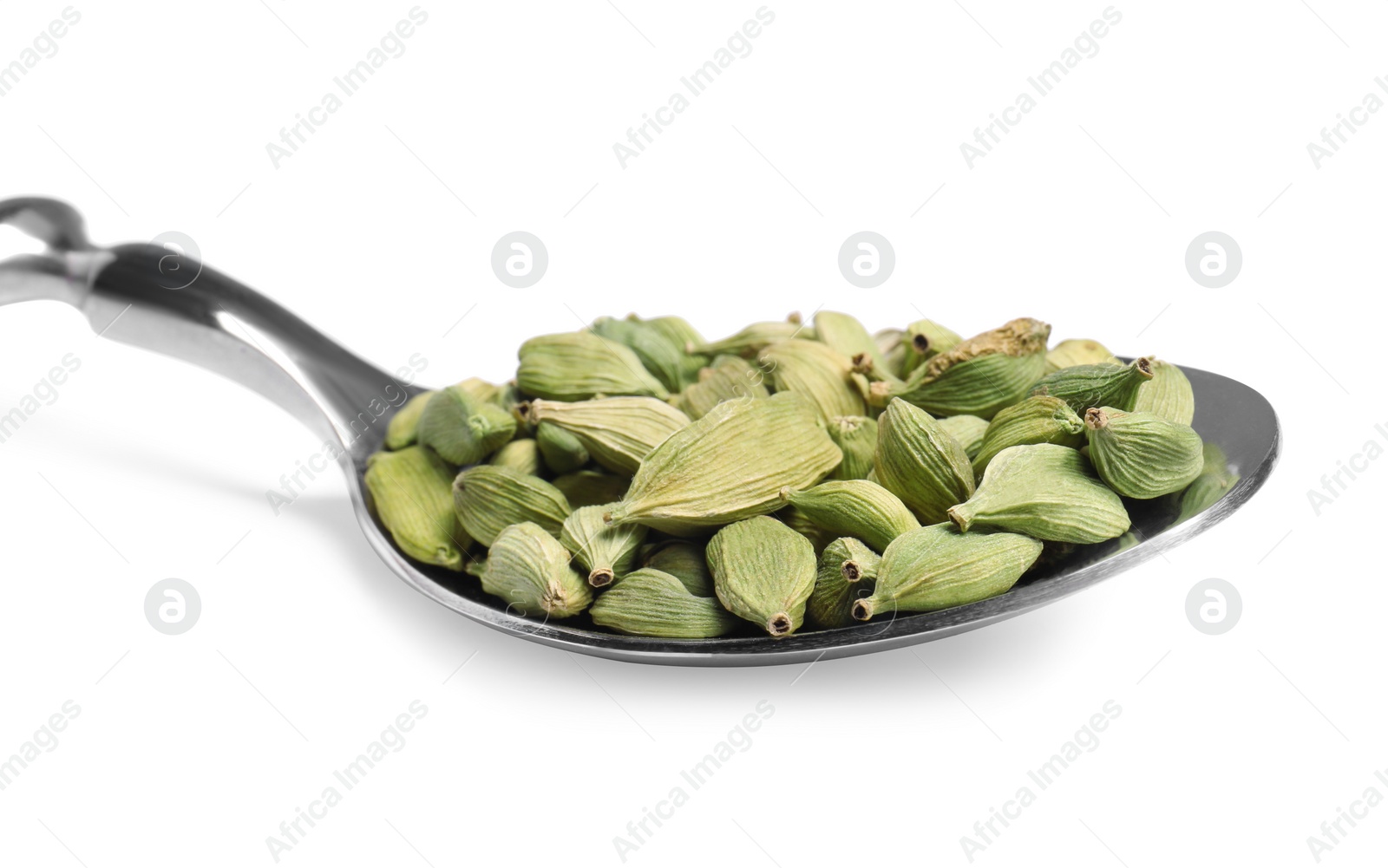 Photo of Spoon full of cardamom on white background, closeup