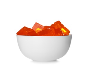 Photo of Bowl with tasty jelly cubes isolated on white