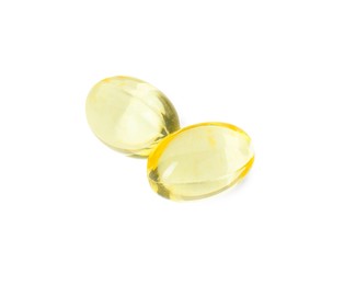 Photo of Vitamin capsules isolated on white. Health supplement