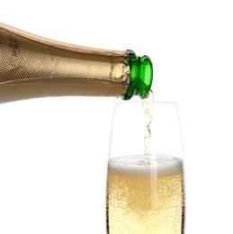 Photo of Pouring champagne from bottle into glass on white background. Festive drink