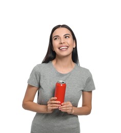 Beautiful happy woman holding red beverage can on white background