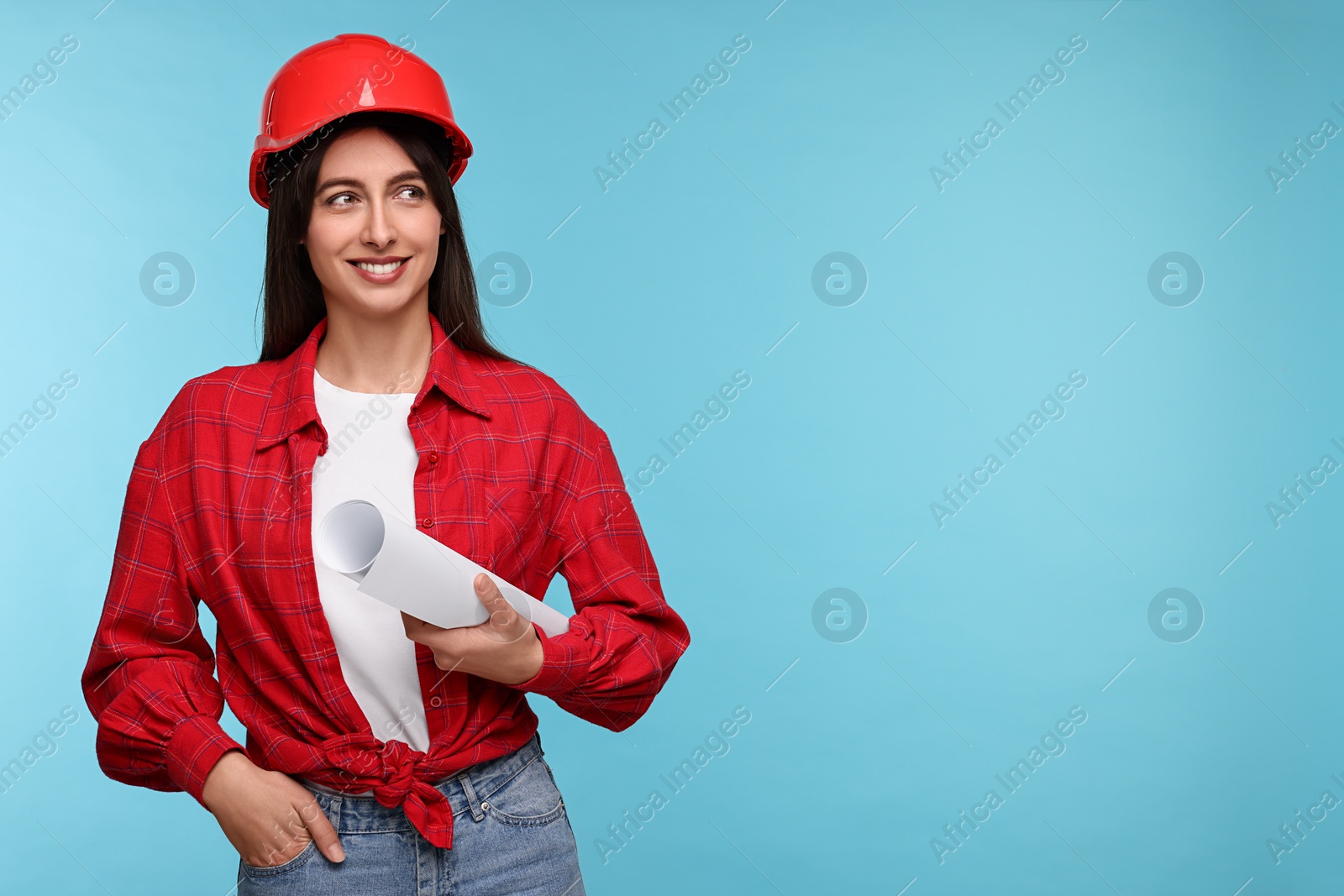 Photo of Architect in hard hat with draft on light blue background, space for text