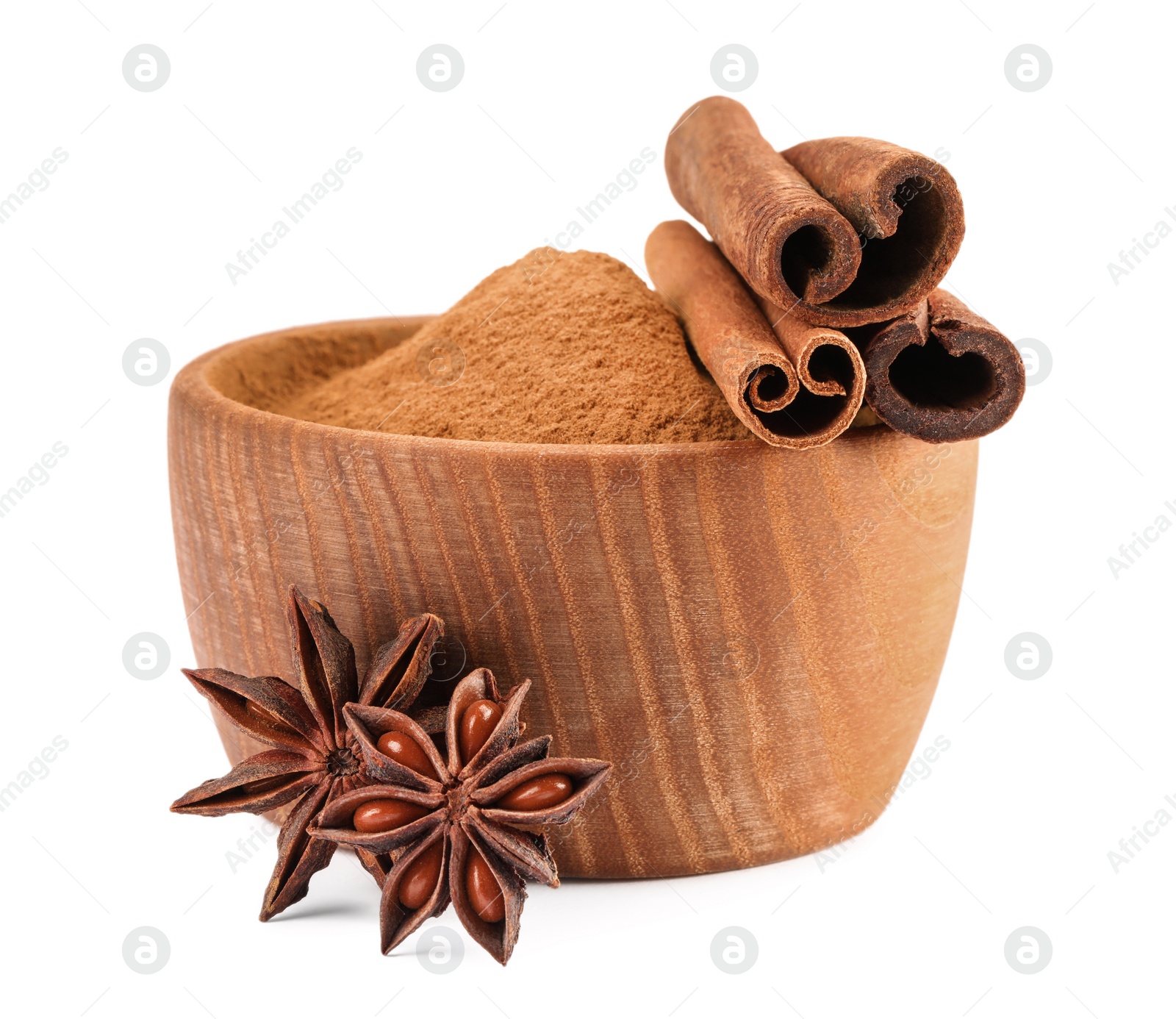 Photo of Dry aromatic cinnamon sticks, powder and anise star isolated on white