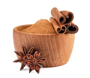 Photo of Dry aromatic cinnamon sticks, powder and anise star isolated on white