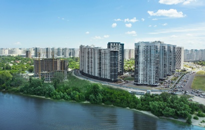 Aerial view of city district on riverside