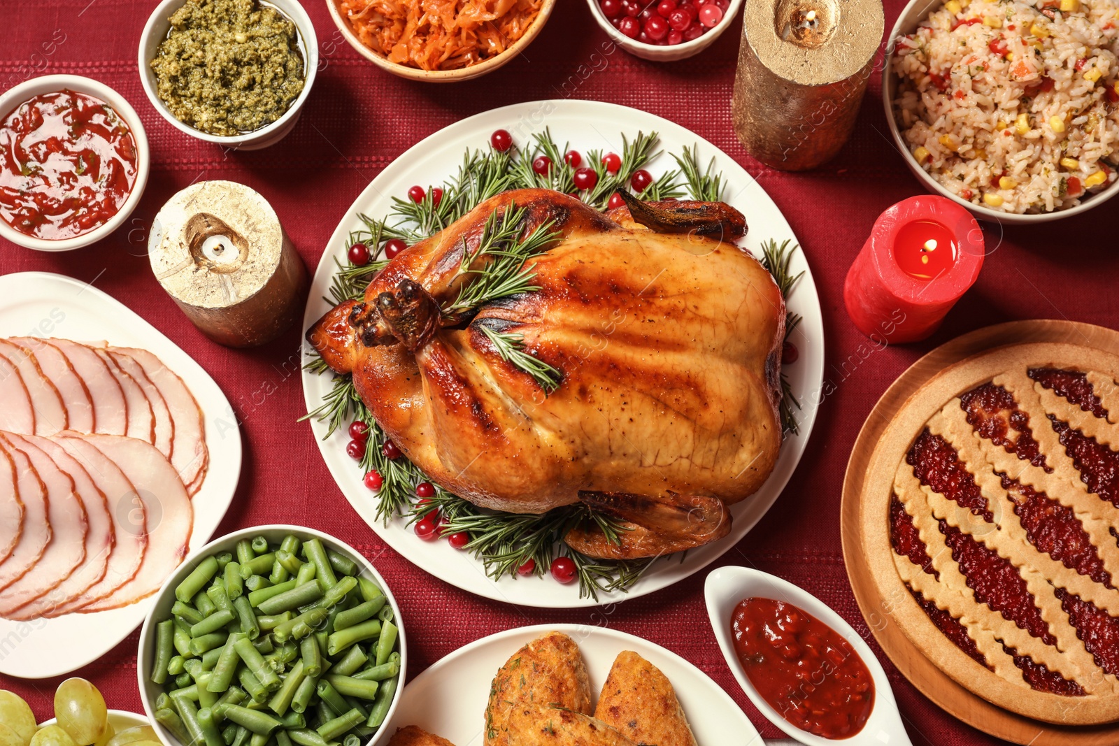 Photo of Traditional festive dinner with delicious roasted turkey served on table, flat lay