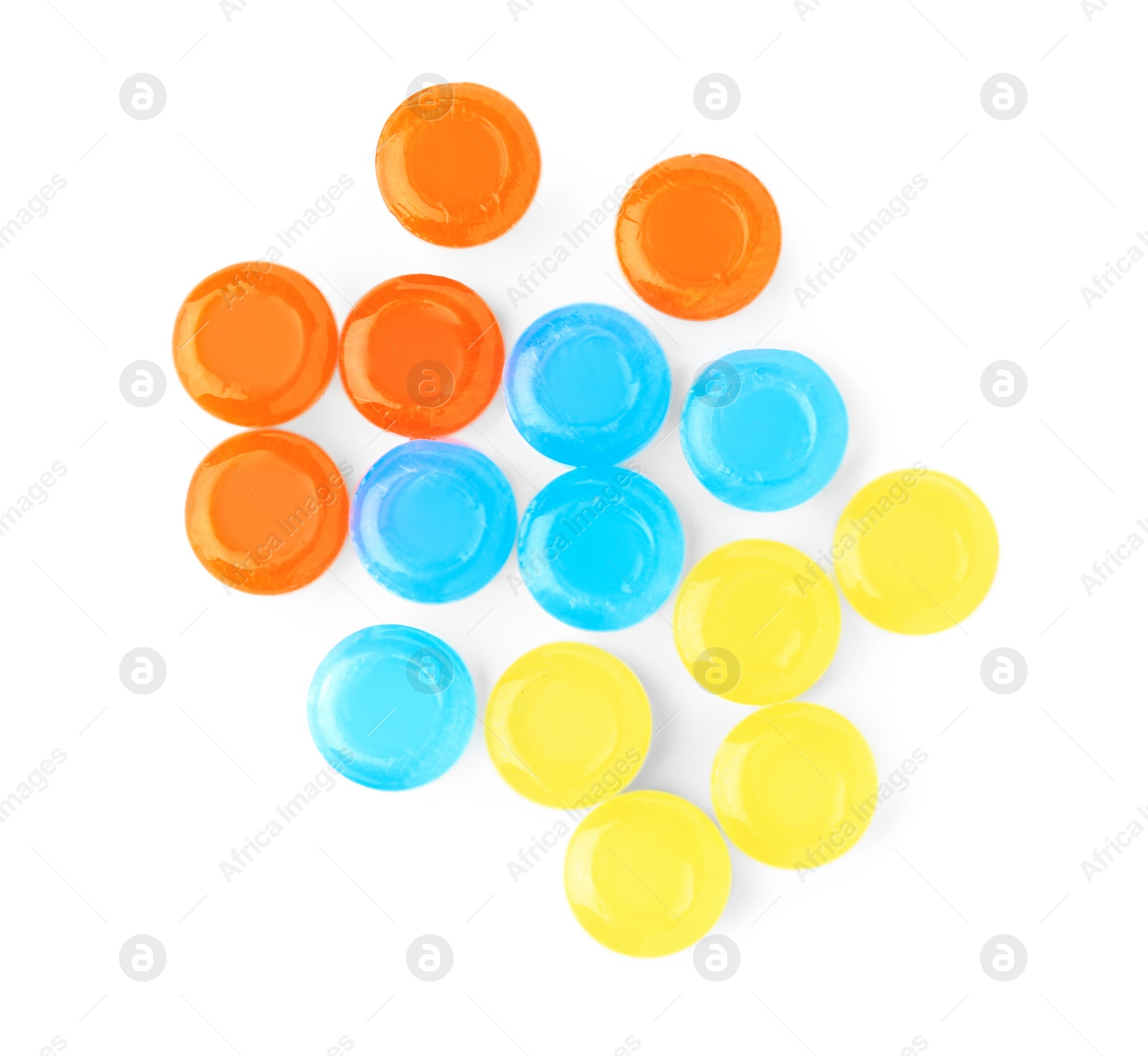 Photo of Many different colorful cough drops on white background, top view