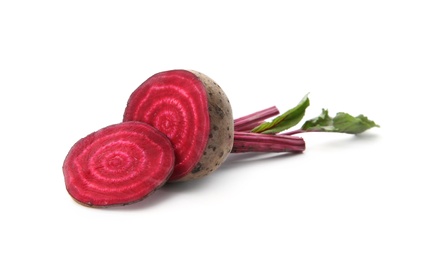 Fresh sliced beet with leaves on white background