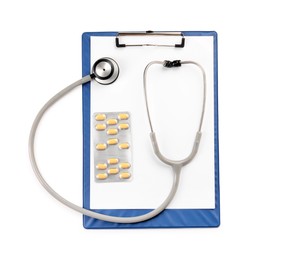 Photo of Stethoscope, pills and clipboard isolated on white, top view. Medical tool