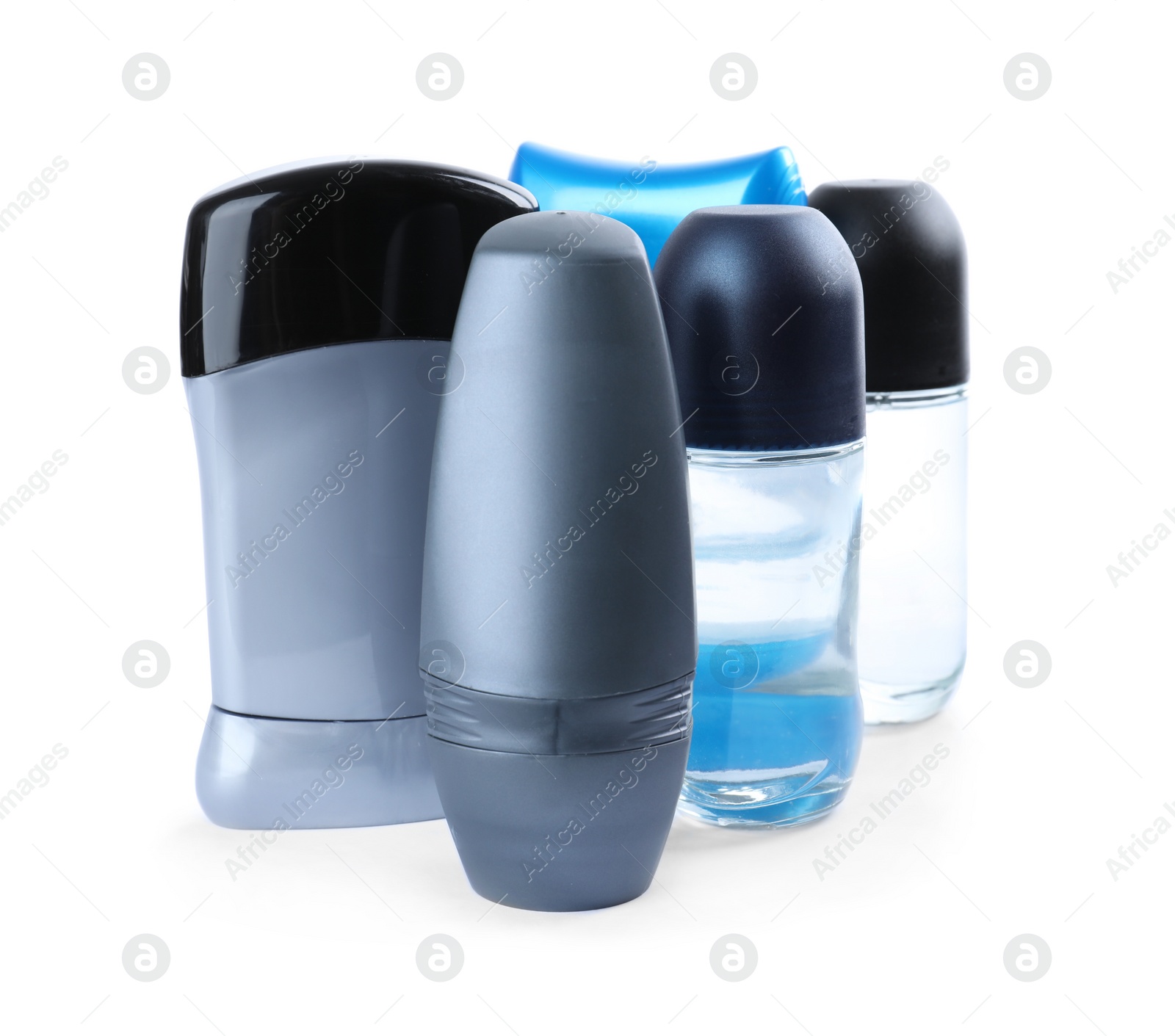 Photo of Different natural male deodorants on white background. Skin care