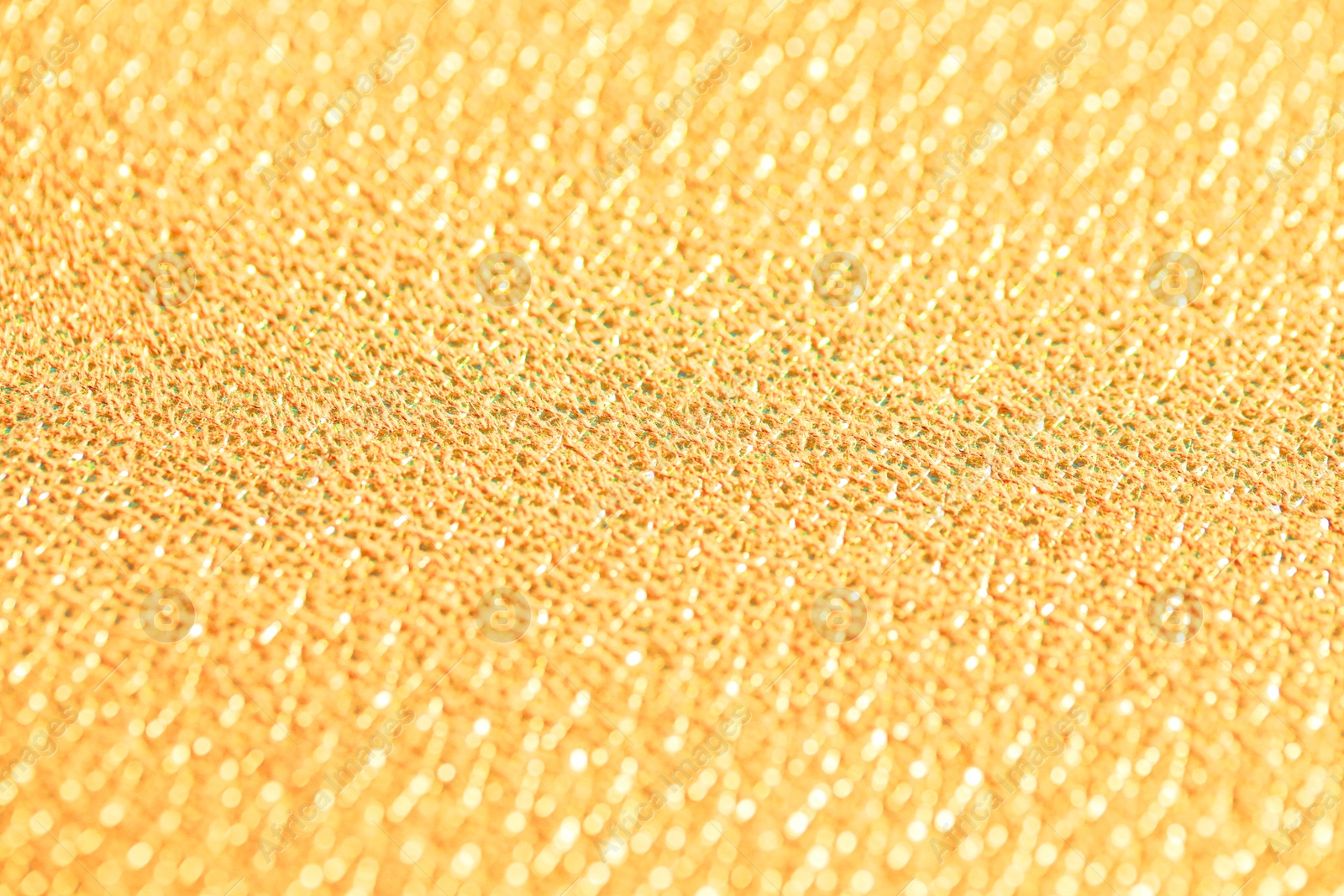 Photo of Beautiful golden texture surface as background, closeup