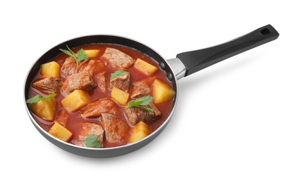 Photo of Delicious goulash in saucepan isolated on white