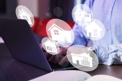 Image of House search. Man choosing home via laptop at table, closeup. Illustrations of different buildings as real estate variations