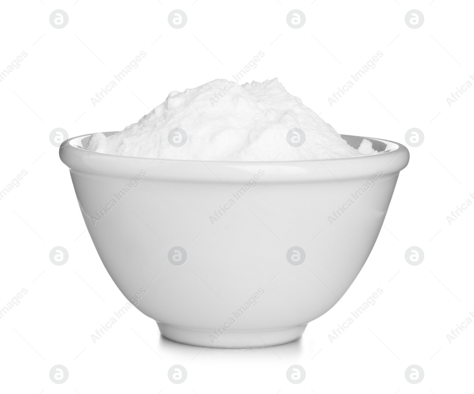 Photo of Bowl with baking soda on white background