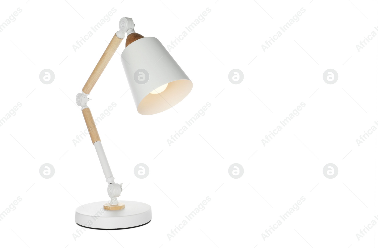 Stylish modern table lamp isolated on white Photo of Stylish modern table lamp isolated on white