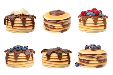 Image of Set of tasty pancakes with toppings isolated on white